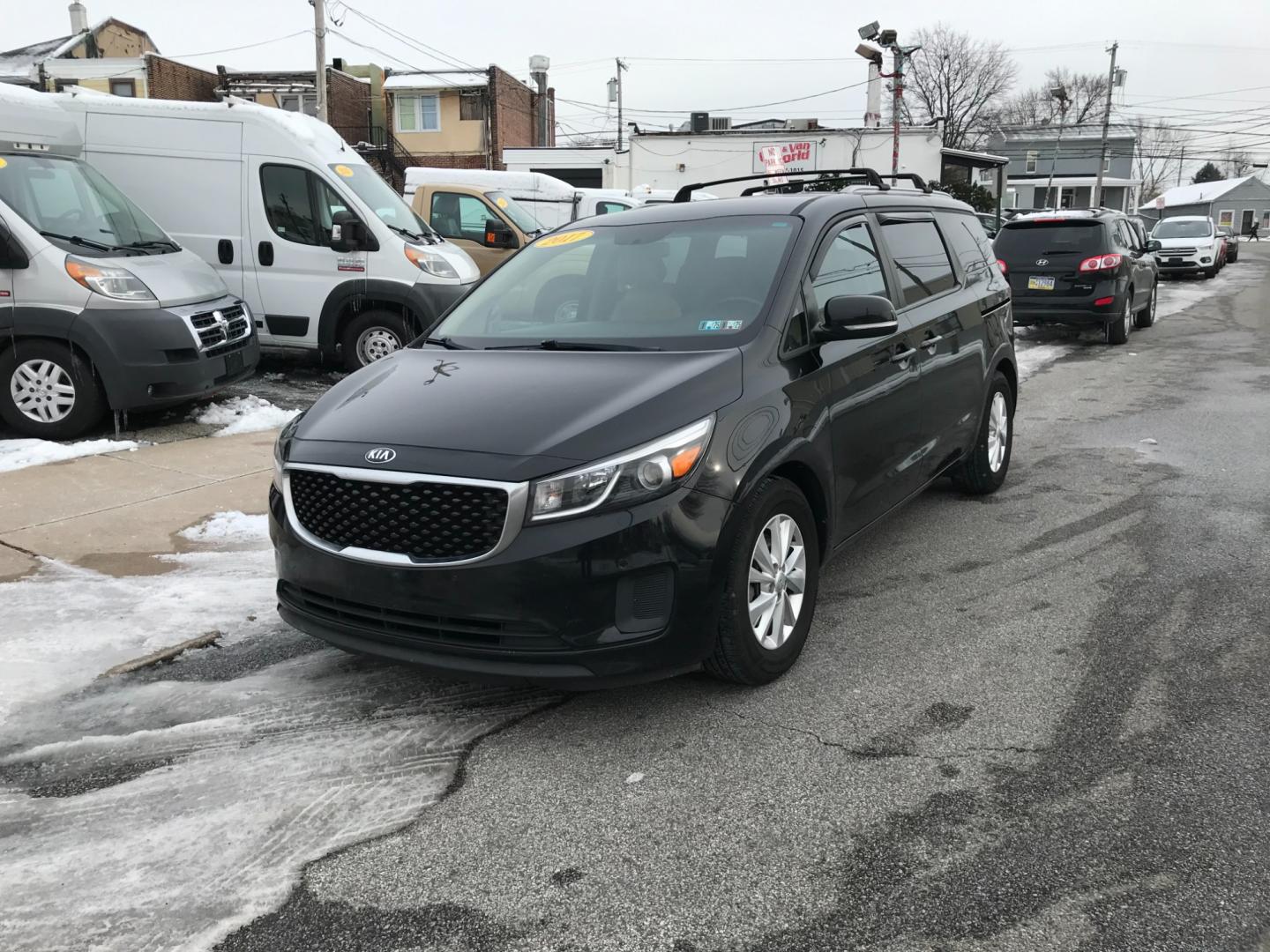 2017 Maroon /Tan Kia Sedona LX (KNDMB5C13H6) with an 3.3 V6 engine, Automatic transmission, located at 577 Chester Pike, Prospect Park, PA, 19076, (610) 237-1015, 39.886154, -75.302338 - Photo#2